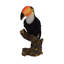 Figurine toucan on souches