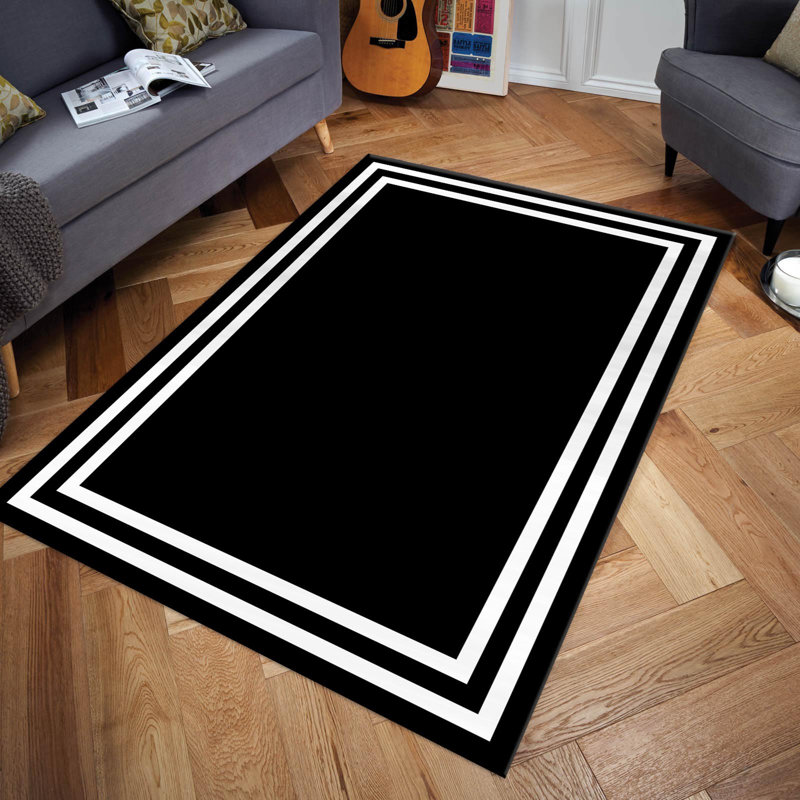 Tapis noir / blanc en polyester tissé à la machine Franco, Rectangle 4 pi 11 po x 7 pi 7 po