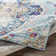 Fleeman Floral Blue Area Rug