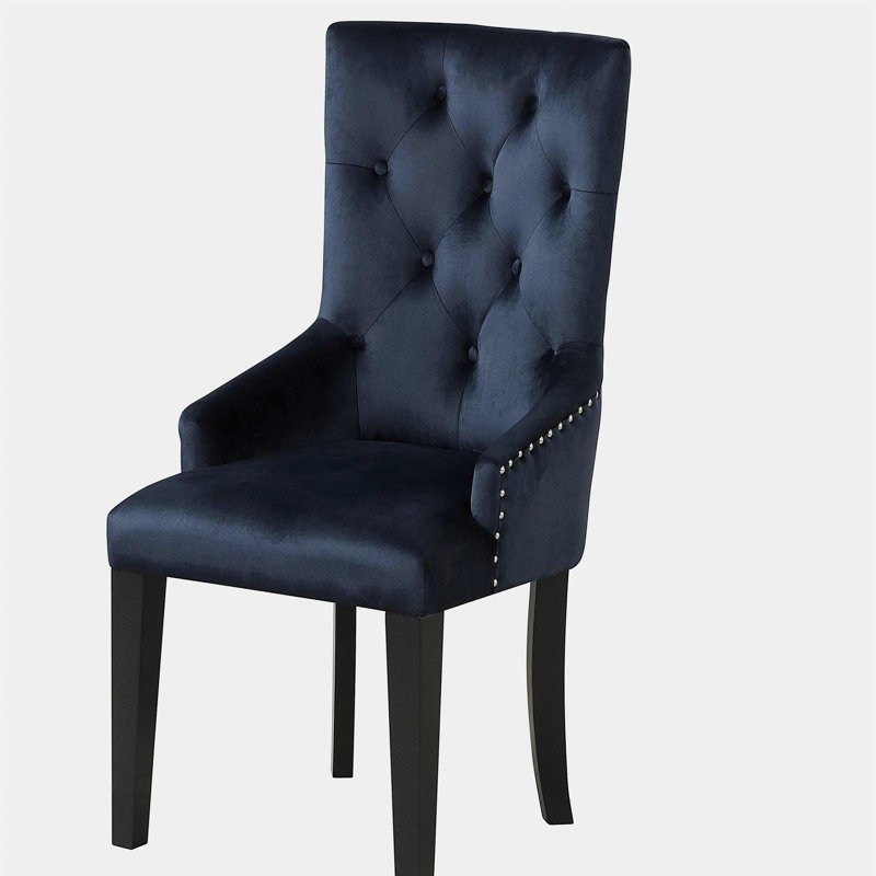 Fauteuil capitonné à dossier
