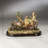 Organ on Cart with Monkey Figurine