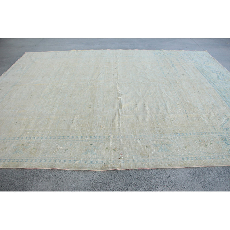 Élégant tapis tissé à la main à motif floral bleu doux et beige pour une décoration d'inspiration rétro