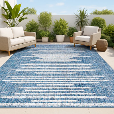 Tapis d'intérieur / extérieur bleu / ivoire à rayures berbères Grundy