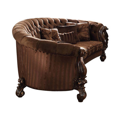  55" Brown Velvet Curved Sofa And Toss Pillows