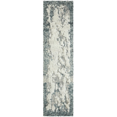 Derekia Wool Abstract Area Rug