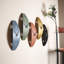 Horloge murale moderne en métal Curve of Time -1340407898-1340407902