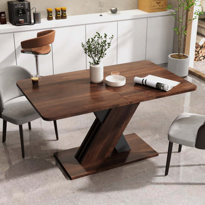 Table de salle à manger multifonctionnelle extensible avec base en forme de X, pour une utilisation polyvalente et un design peu encombrant dans n'importe quelle maison