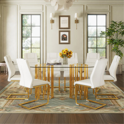 Table and chair set.71 inch oval tempered glass dining table,gold double column light luxury style,White High-quality PU Chairs With Golden Arched Met