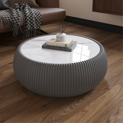 Table basse moderne en cuir fritté clair en forme de tambour pour les meubles de salon (chaque plateau de table possède un motif gris unique)