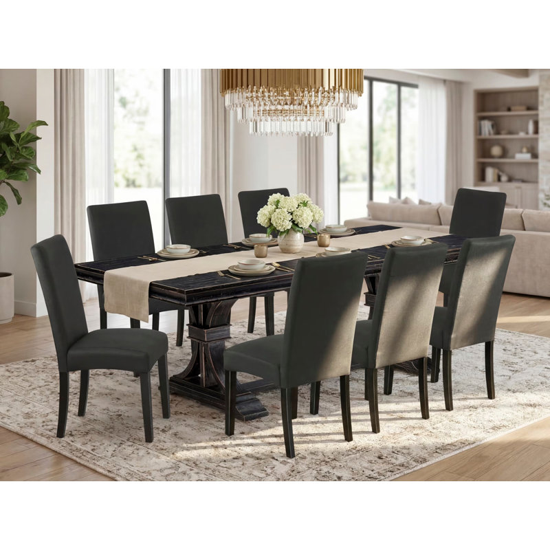 L'ensemble de table de cuisine 9 pièces se compose d'une table rectangulaire et de 8 chaises de salle à manger en tissu de lin noir avec dossier rembourré au fini noir sablé.