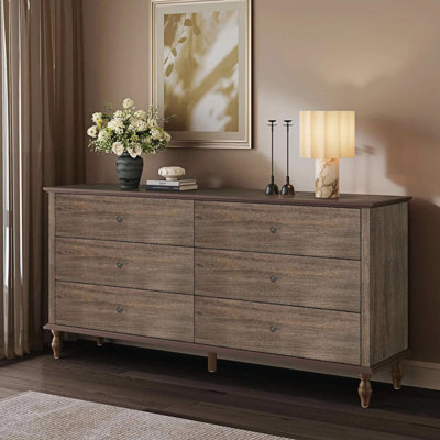 Commode en bois avec glissières à fermeture automatique et poignées en cuivre