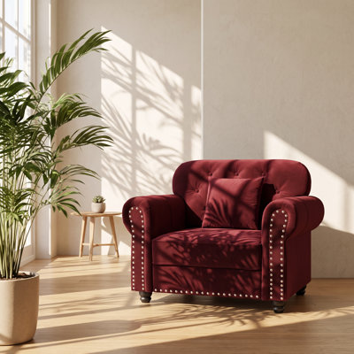 Canapé Chesterfield une place en velours capitonné, accoudoirs arrondis, dimensions : 105 cm (L) x 76 cm (P) x 86 cm (H).