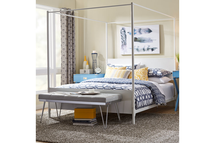 bedroom with patterned curtains, pillows, and duvet cover