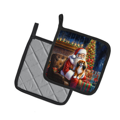 Paire de poignées d'épagneul tibétain et père Noël