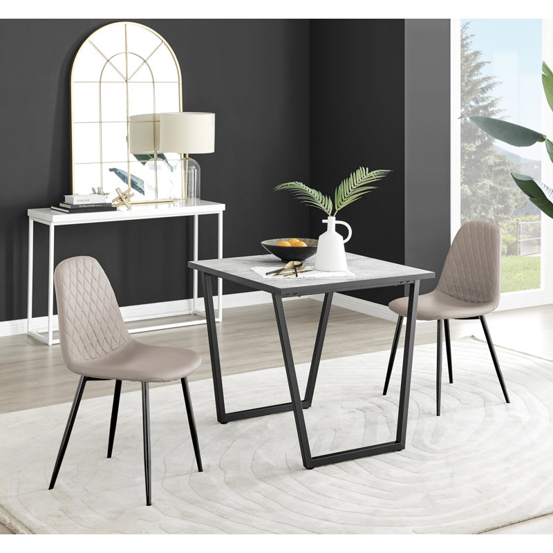 Table de salle à manger et chaises en mélamine effet marbre Carzon - Chaises de salle à manger en similicuir de luxe