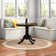 Charlton Home® Comari Round Solid Wood Dining Table & Reviews 