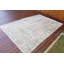 Elegant Neutral Tone Area Rug With Minimalist Design Perfect For Modern Home Decor Crafted From Soft And Durable Fabric