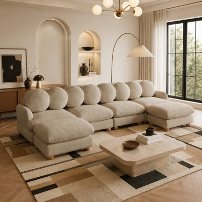 Grand canapé d'angle modulable en chenille, 6 places, avec 8 coussins décoratifs, pouf amovible et structure en bois massif pour un confort et un style polyvalents.