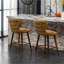 Tabouret de comptoir jaune de style Mid-Century moderne à 2 boutons, revêtement en tissu, garniture cloutée, paire de pieds en bois massif, siège incurvé, repose-pieds en métal