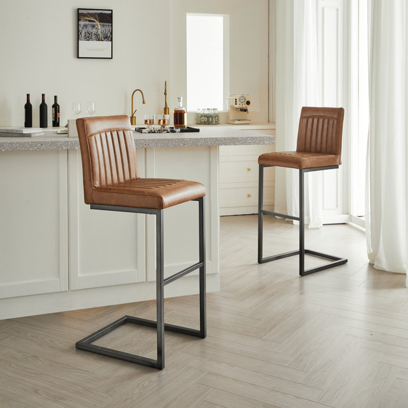 Tabouret de bar en similicuir brun - structure en métal noir robuste et siège rembourré, sièges élégants pour îlot de cuisine, bar à domicile et salle à manger, 2 ensembles