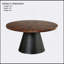 Table basse ronde de style contemporain avec plateau biseauté et base cylindrique, parfaite pour les espaces de vie modernes