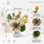 Arrangement artificiel orchidée et boule de Billy avec hortensia dans un vase en verre nervuré