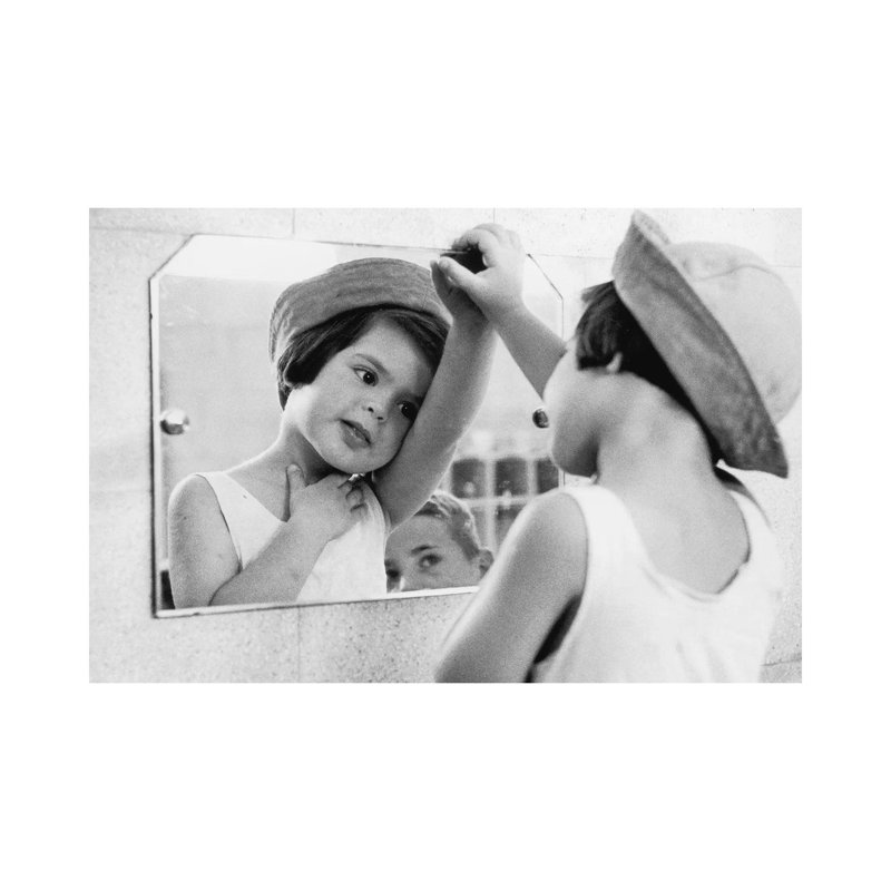 Tirza In Mirror (Israel, 1951) by Ruth Orkin - Print on Canvas, 30.48 cm H x 45.72 cm W, Wrapped Canvas