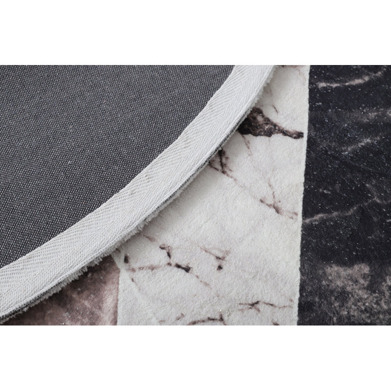 Tapis brun Telesphoros, Rond 5 pi
