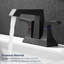 Robinet en métal durable à deux poignées, élégance moderne pour la salle de bain, finition noir mat