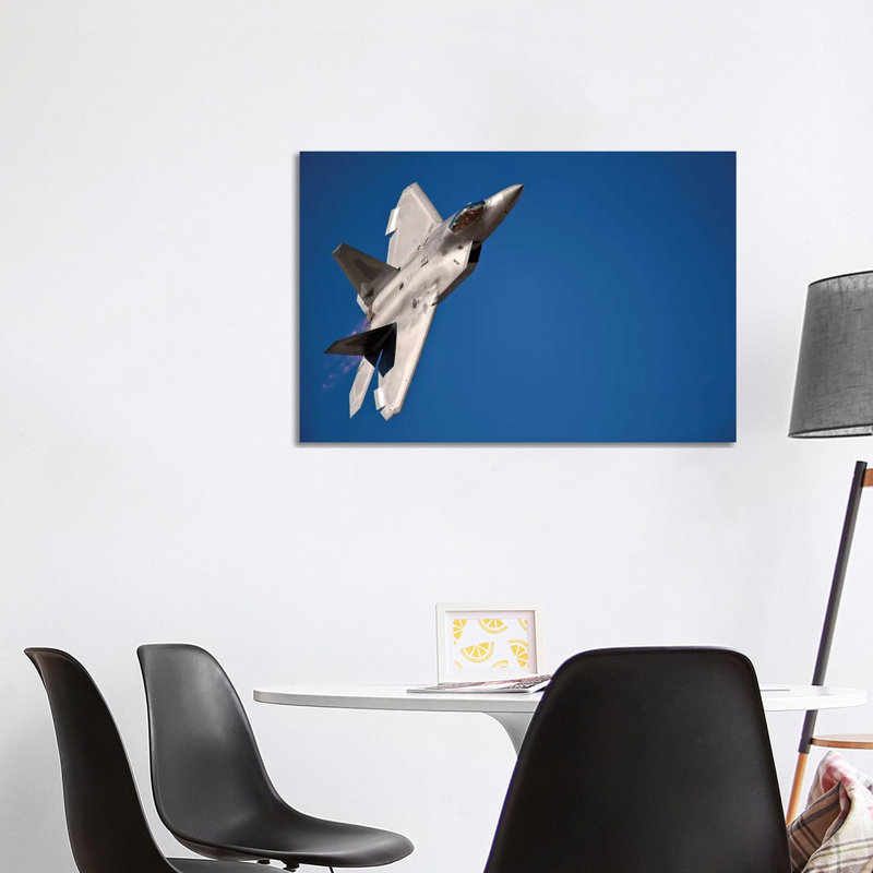 An F-22 Raptor Aircraft Performs During Aviation Nation 2010 by Stocktrek Images - Wrapped Canvas Print