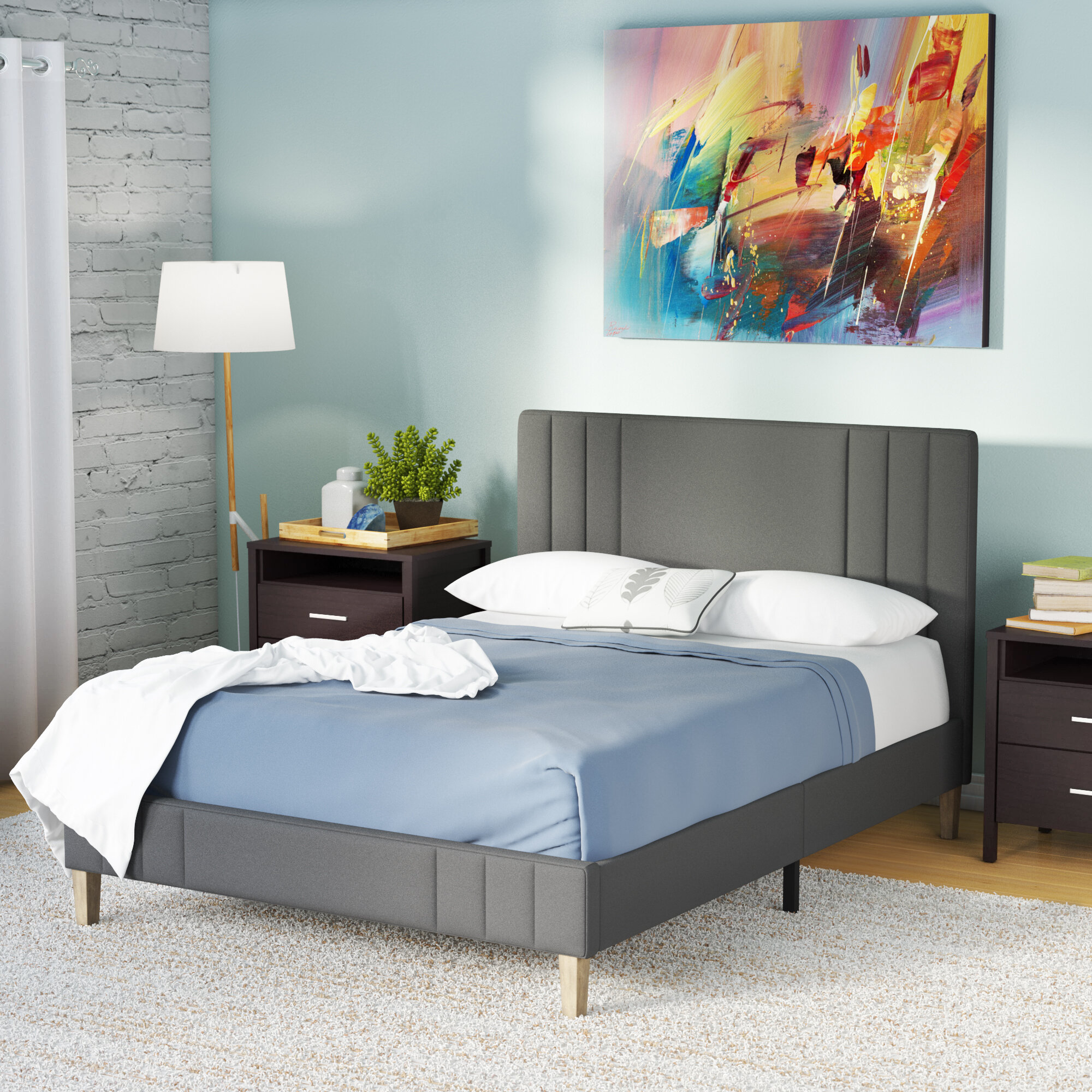 Moniz upholstered store platform bed