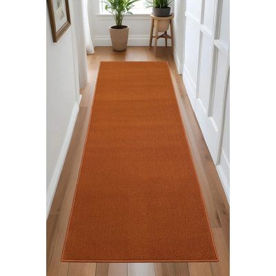 Tapis de couloir rouille orange brûlé à profil bas sur mesure