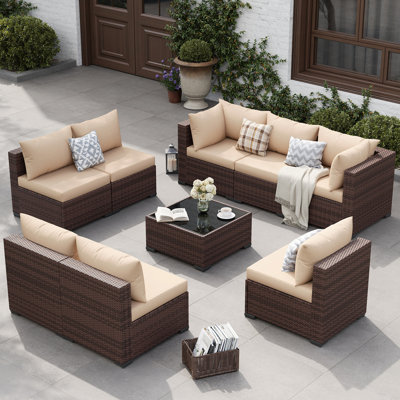 9 Piece Rattan Sectional Seating Group with Cushions