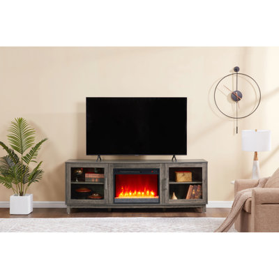 Meuble télé de 70 pouces de large, fini noyer gris, foyer et chauffage intégrés, 11 réglages de température, 7 couleurs de flamme possibles, minuterie, 2 placards de rangement, tablette, éclairage DEL, profondeur de 15,5 pouces.