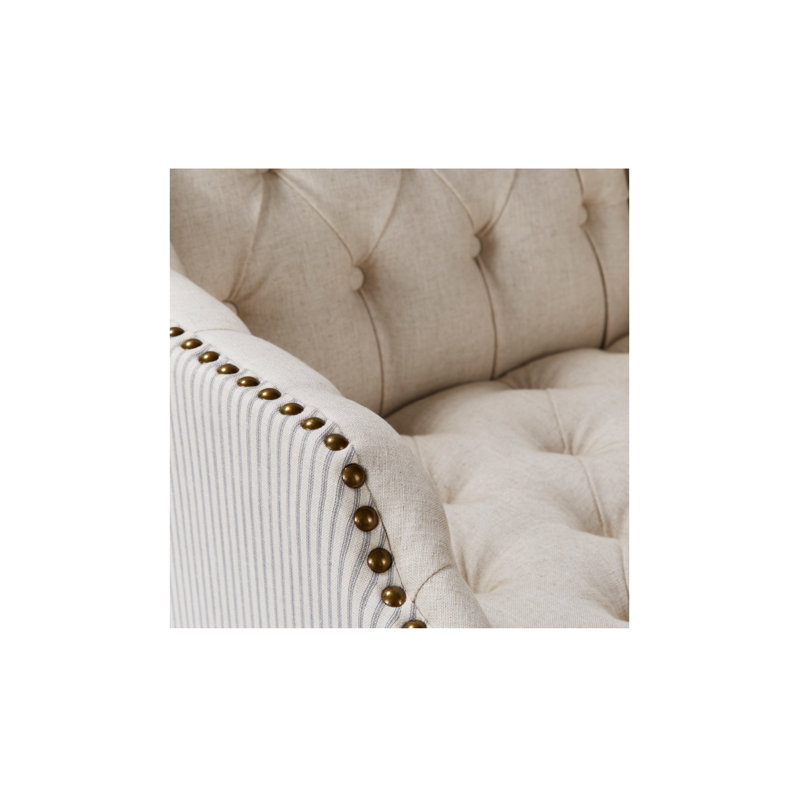 Fauteuil à oreilles rembourré Bassett