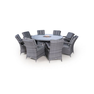 Otero 8 - Person Wicker Patio Dining Set with Round Table , Cushions Included
