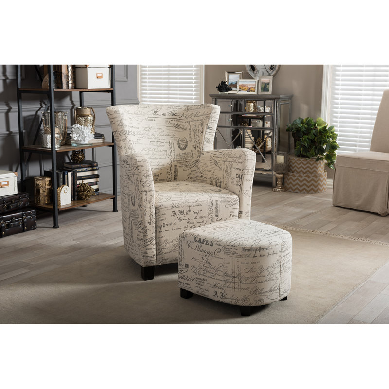 Upholstered Armchair with Footstool