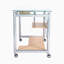 Bureau d'ordinateur à roulettes Techni Mobile, verre et argent