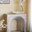 32.3X14.2X29.9" Modern Arched Sculptural Console Table With Beige Faux Travertine Finish