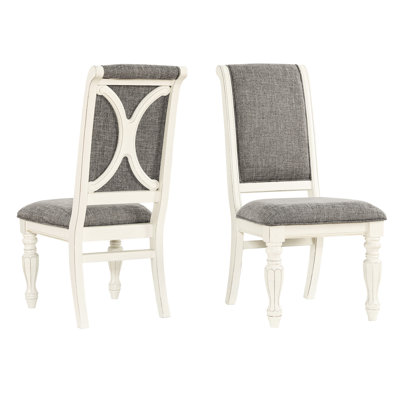 Upholstered Dining Chair , 2. Gray Cloth Cover, Thick Foam. Antique White Solid Wood Frame. Turned French Legs In Cream. High Rolled Back For Class. Rubberwood Durability. 19.21"W X 26"D 42.5"H.