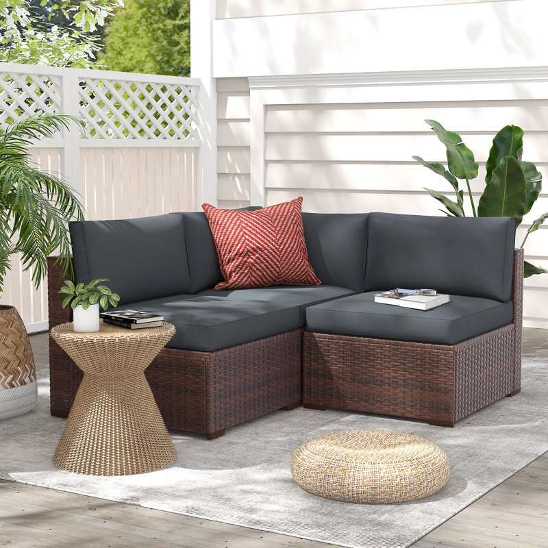 Bryonny 4 Piece Sectional Seating Group with Cushions, Brown Frame/Dark Gray Cushion