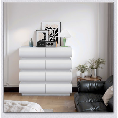 Commode blanche élégante à 8 tiroirs avec un design sans poignée, parfaite pour les chambres modernes et organisées
