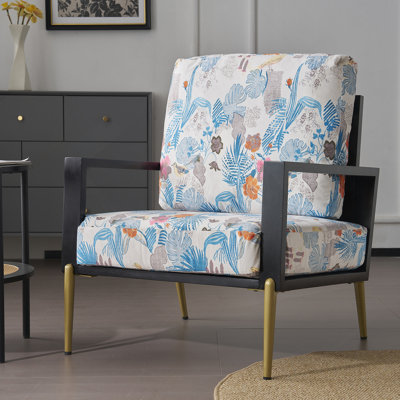 Fauteuil en velours rétro à imprimé floral avec dossier bas et pieds en métal doré et structure en bois d'hévéa