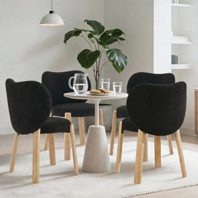 Set of Four Black  Fabric Heart Back Accent Chairs with Cozy Upholstered Seats Statement Lounge Seating for Living Room Bedroom or Reading Nook Modern Style for Relaxing Conversation and Everyday Use