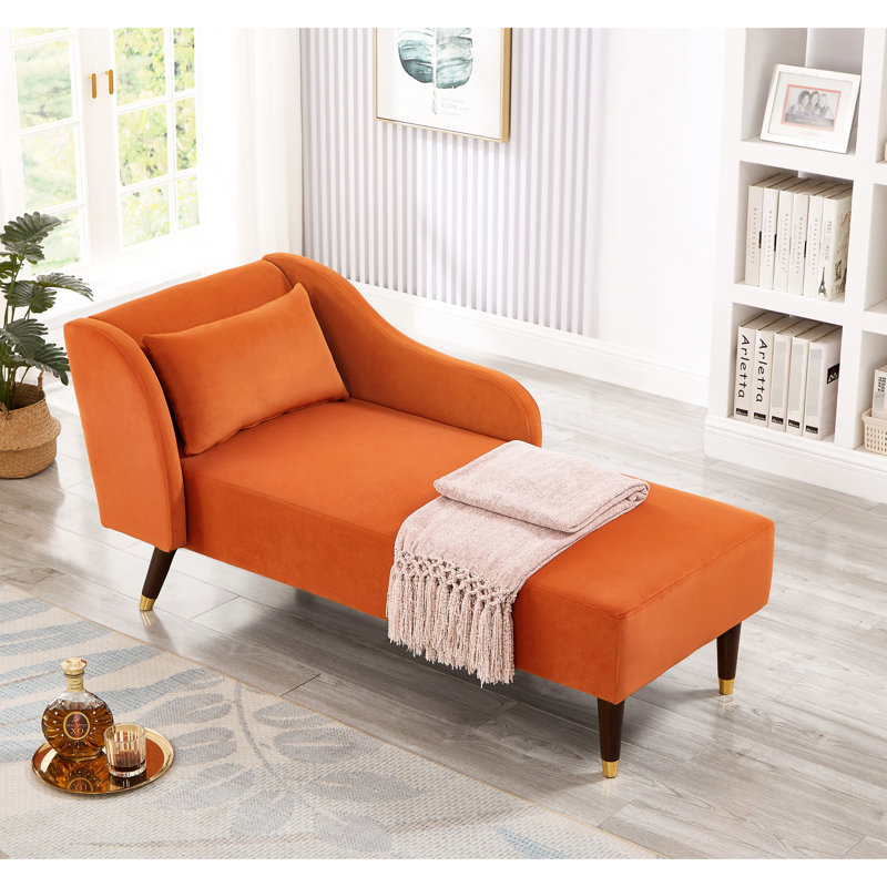 Fauteuil élégant en velours orange avec un revêtement doux -