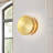 1-Light 4.7" Dimmable Minimalist Round LED Wall Sconce with Warm Brass Finish
