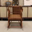 Chaise berçante en rotin naturel
