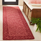 Balyeet Hand Tufted Wool/Cotton Oriental Rug in Red