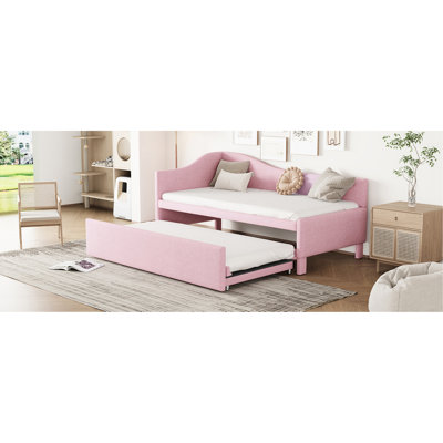 Lit de jour simple en L rembourré en forme de L avec lit gigogne, convertible en très grand lit pour diverses situations dans de bons espaces familiaux