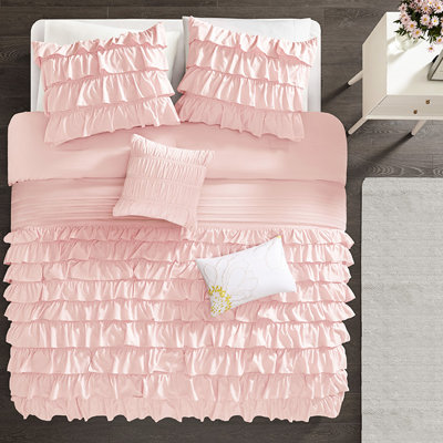 Blush Comforter With Flowing Ruffles And Filling Decorative Pillows